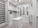 Bright walk-in closet with custom shelving and an island at 3625 Tuxedo Nw Rd, Atlanta, GA 30305