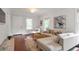 Cozy living room with a comfortable sectional sofa, modern decor, and plenty of natural light at 1265 Woodland Se Ave, Atlanta, GA 30316