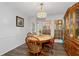 Charming dining room featuring a wooden table and ample natural light at 410 Lima Ct, Woodstock, GA 30188