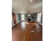 Living room features original wood floors, fireplace, and freshly painted walls at 4622 Dogwood Rd, Pine Lake, GA 30072