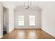 Bedroom features hardwood floors, neutral walls, and natural lighting from the surrounding windows at 100 Sheridan Dr, Atlanta, GA 30305