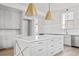 Spacious kitchen featuring a large center island with white countertop, gray cabinetry, and stainless steel appliances at 100 Sheridan Dr, Atlanta, GA 30305
