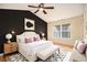 Stylish bedroom with accent wall, modern furnishings, and neutral color palette at 3364 Thornbridge Dr # 0, Powder Springs, GA 30127