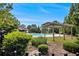 Relaxing community pool with pergola and adjacent clubhouse offer residents leisure and social opportunities at 3364 Thornbridge Dr # 0, Powder Springs, GA 30127