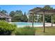 The community pool offers a pergola and green vegetation for a serene, outdoor lifestyle at 3364 Thornbridge Dr # 0, Powder Springs, GA 30127