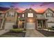 Charming townhome with brick and siding exterior, featuring a one-car garage and well-maintained landscaping at 3364 Thornbridge Dr # 0, Powder Springs, GA 30127