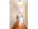 Hallway featuring hardwood floors and a view into the living room at 3364 Thornbridge Dr # 0, Powder Springs, GA 30127