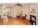 Spacious living room with a fireplace, hardwood floors, and access to the entryway at 3364 Thornbridge Dr # 0, Powder Springs, GA 30127