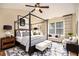 Beautiful primary bedroom with canopy bed, stylish furnishings, and plenty of natural light at 3364 Thornbridge Dr # 0, Powder Springs, GA 30127