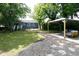 Large backyard with a home, a yard, an outdoor seating area, and mature trees at 139 Merritt Se St, Marietta, GA 30060