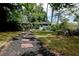 Expansive backyard with established landscaping, a shaded gazebo, and a storage shed at 139 Merritt Se St, Marietta, GA 30060