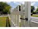 Charming white picket fence surrounding the property, offering curb appeal and security at 139 Merritt Se St, Marietta, GA 30060