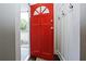 Bright foyer with a red front door and coat hooks, leading into the home's interior at 139 Merritt Se St, Marietta, GA 30060