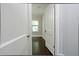 Hallway view into a bedroom, showcasing natural light and hardwood floors at 139 Merritt Se St, Marietta, GA 30060