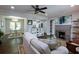 The living room showcases an open floor plan with fireplace and view into the dining area at 139 Merritt Se St, Marietta, GA 30060