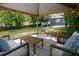 Inviting outdoor seating area with modern furniture under a shaded structure at 139 Merritt Se St, Marietta, GA 30060