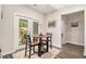 Cozy breakfast nook with a table, natural light, and sliding doors leading to the outdoors, ideal for morning coffee at 30 Deer Creek Ct, Moreland, GA 30259