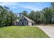 Beautiful single Gathering home with large front yard and attached two car garage at 30 Deer Creek Ct, Moreland, GA 30259