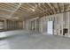 Spacious unfinished basement with exposed ceiling and framing at 7625 Breeze Bay Rd, Cumming, GA 30041