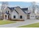 Beautiful exterior of home, with large driveway and three-car garage at 7625 Breeze Bay Rd, Cumming, GA 30041