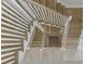 Staircase featuring wood stairs and white banisters as seen from the top looking down at 7625 Breeze Bay Rd, Cumming, GA 30041