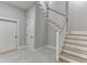 A newly constructed staircase with white railings and light wood steps at 7625 Breeze Bay Rd, Cumming, GA 30041