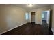 Bedroom with hardwood floors and bright windows at 767 Vinson Pl, Atlanta, GA 30315