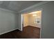 Classic dining room showcasing hardwood floors and a modern chandelier at 767 Vinson Pl, Atlanta, GA 30315