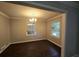 Cozy dining room featuring hardwood floors and a stylish chandelier at 767 Vinson Pl, Atlanta, GA 30315