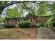 Charming single-story home with a covered carport and traditional brick facade at 767 Vinson Pl, Atlanta, GA 30315