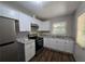 Well-equipped kitchen boasting stainless steel appliances and granite countertops at 767 Vinson Pl, Atlanta, GA 30315
