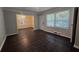 Inviting living room featuring hardwood floors and bright windows at 767 Vinson Pl, Atlanta, GA 30315