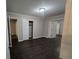 Spacious main bedroom featuring hardwood floors, neutral walls, and closet space at 767 Vinson Pl, Atlanta, GA 30315
