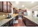 Updated kitchen featuring stainless steel appliances, granite countertops, and ample storage space at 85 Foxgrove Cv, Covington, GA 30014
