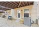 Backyard patio featuring gravel, A/C unit, exterior door, and under-deck support at , Atlanta, GA 30318