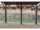 View of backyard retaining wall and under-deck space with support posts and gravel at , Atlanta, GA 30318
