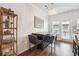 Dining area with a dark wood table, seating for four, and modern light fixture at , Atlanta, GA 30318