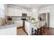Modern kitchen features granite countertops, stainless steel appliances, and a center island with bar seating at , Atlanta, GA 30318