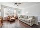 Inviting living room features hardwood floors, neutral paint, and comfortable seating, illuminated by natural light at , Atlanta, GA 30318