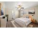 Well-lit bedroom features neutral walls, ceiling fan, and carpet at 2300 Newport Lndg, Atlanta, GA 30009
