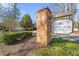 Welcome to Jamestown Oldtown: A charming community with a welcoming entrance and beautiful landscaping at 2300 Newport Lndg, Atlanta, GA 30009