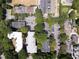 Stunning aerial view of the property and surrounding neighborhood, with ample parking and mature trees at 272 14Th St # 23, Atlanta, GA 30309