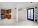 Spacious Basement featuring an exterior door, ceramic tile flooring, and a finished kitchen at 272 14Th St # 23, Atlanta, GA 30309