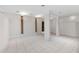 Spacious Basement features large-format tile flooring and support columns at 272 14Th St # 23, Atlanta, GA 30309