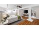 Bright bedroom with hardwood floors, accent lights, and stylish ceiling fan at 272 14Th St # 23, Atlanta, GA 30309