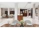 Open concept design dining area with direct view of the kitchen and adjacent living area at 272 14Th St # 23, Atlanta, GA 30309