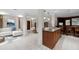 Open concept kitchen with granite countertops, a breakfast bar, and a connected living area at 272 14Th St # 23, Atlanta, GA 30309