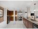 Modern kitchen with stainless steel appliances, granite countertops, and adjacent dining area at 272 14Th St # 23, Atlanta, GA 30309