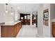 Spacious kitchen featuring a breakfast bar, ample cabinet space, granite countertops, and stainless steel appliances at 272 14Th St # 23, Atlanta, GA 30309
