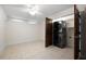 Bedroom featuring a convenient, modern stacked washer and dryer unit inside closet with wooden doors at 272 14Th St # 23, Atlanta, GA 30309